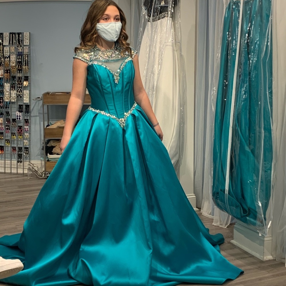 pageant dress size 8, blue green in color